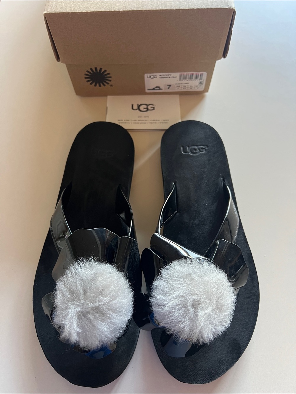 UGG Women's Black Patent Sandals with Light Gray Pom Pom